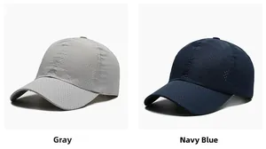 Detail view of quick-dry baseball caps in grey and navy blue with laser-cut breathability