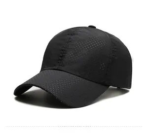 Detail view of black breathable quick-dry baseball cap showing laser-cut ventilation holes