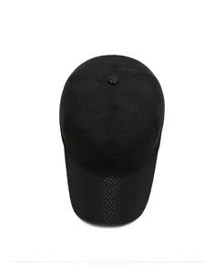 Close-up of black breathable mesh baseball cap showing laser-cut ventilation holes