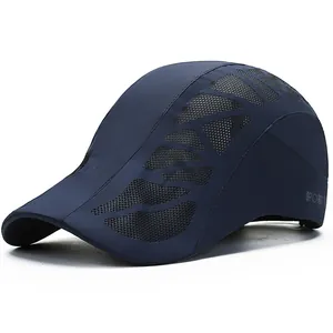 Navy blue breathable mesh flat cap for men featuring a reflective sports logo and sun protection