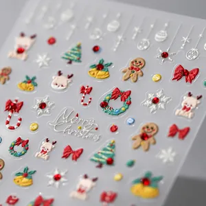 3D embossed Christmas nail stickers featuring reindeer and gingerbread man patterns
