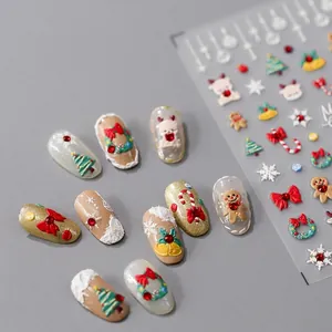 3D embossed Christmas nail art stickers with reindeer, gingerbread man and bow designs