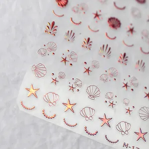 Stickers ongles 3D coquillage et étoile de mer en or rose avec finition laser métallique