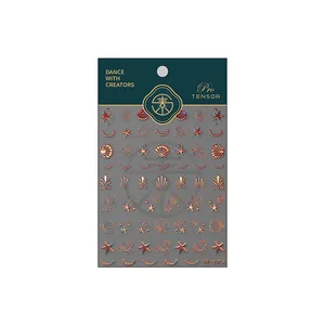 Autocollants ongles 3D avec dorure métallique et motifs de coquillages nacrés marins