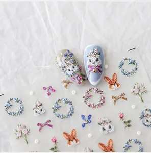 Makro-Detail von 3D-Prägung Hasen und Blumen Stickerei Textur Nagelkunst Aufkleber