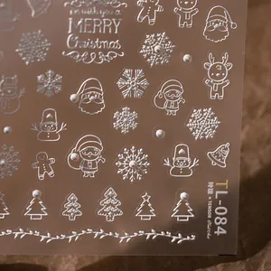 3D embossed Christmas nail art stickers featuring Santa, snowflakes, and gingerbread patterns