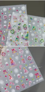 Detail view of 3D embossed Christmas nail stickers with snowflakes and trees style M-253