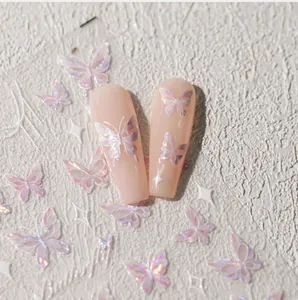 Macro detail of 3D iridescent butterfly nail stickers with holographic laser effects