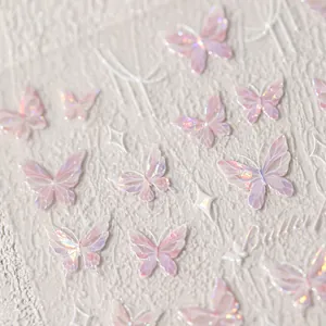 Macro detail of 3D embossed butterfly nail stickers with aurora laser iridescent effect