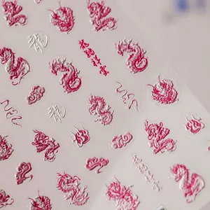 3D embossed nail art stickers featuring pink dragon and auspicious clouds motifs