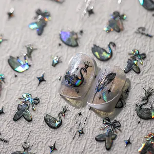 Laser holographic nail stickers featuring black swan and butterfly bow designs with aurora effect