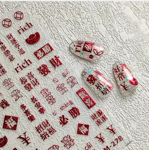 Close-up of M-278 red metallic nail art stickers with lucky Chinese characters and rich text