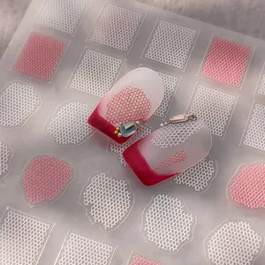 Self-adhesive nail art stickers with red and white lace honeycomb pattern and gems