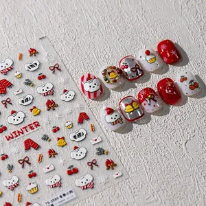 Winter puppy Christmas nail stickers with festive dog, snowflake and cherry designs