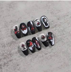 Macro shot of 5D gothic press-on nails featuring black cat, rose, and magic mirror art