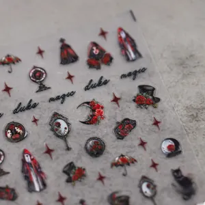 Close-up of gothic 5D embossed nail stickers with red roses and dark magic motifs