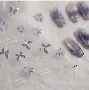 Macro view of purple butterfly nail stickers M-317 with laser silver floral design