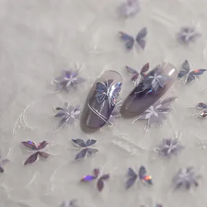 Purple laser butterfly nail stickers with gold stamping and iridescent flower designs