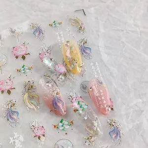 Chinese style nail art decals featuring koi fish and peony patterns on transparent film