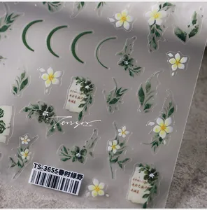 Macro view of TS-3655 embossed nail stickers with green leaves and floral pattern