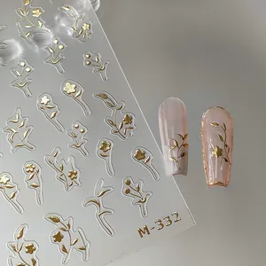 Golden floral nail art stickers with metallic floral patterns and leaves for manicure