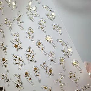 Gold leaf floral nail art stickers with embossed metallic flowers and leaves M-332