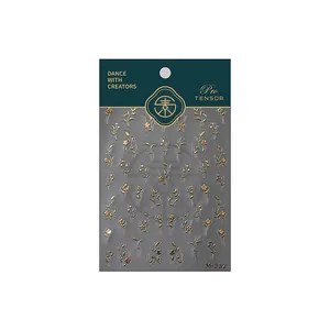 Golden floral nail art stickers M-332 with embossed leaves on thin adhesive backing