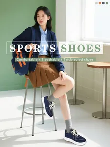 Detail of navy canvas sneakers with thick white soles and preppy styling on a model