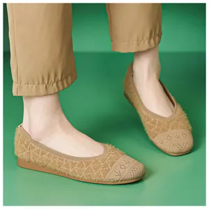 Detail of tan knit flat shoes with diamond pattern and plush texture for women