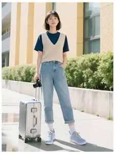Outdoor shot of light blue platform sneakers styled for a casual travel outfit
