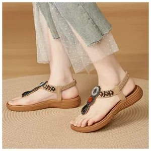 Close-up of bohemian sandals featuring ethnic beads and comfortable elastic heel strap