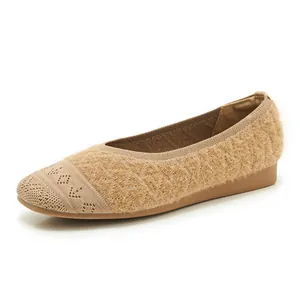 Detail view of khaki knit loafers featuring cozy faux fur trim and textured diamond weave