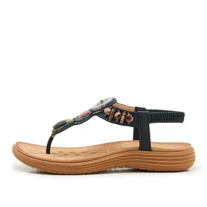 Detail of Bohemian sandals with ethnic beads, sequins and anti-slip massage footbed