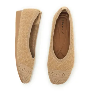 Macro view of camel knit texture and woven patterns on these cozy low-heel flats