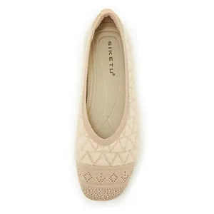 Detailed top view of apricot knit flat shoe with mesh hollow pattern and comfy sole