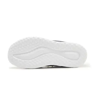Detail of lightweight white sneaker sole with anti-slip honeycomb and wave textures