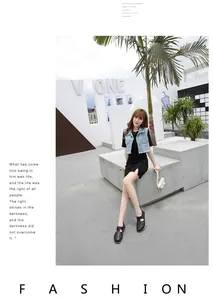 Fashionable outdoor look featuring black cutout leather shoes and a denim vest set