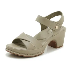 Women's khaki platform block heel sandals with criss-cross straps and ankle closure