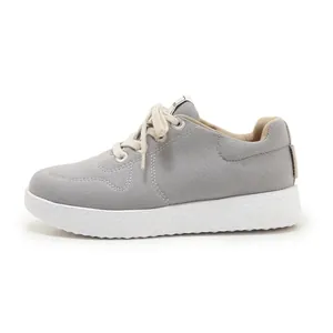 Grey canvas sneakers for women with white platform sole and lightweight casual design