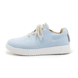 Sky blue casual canvas sneaker with thick white rubber sole and lace-up closure