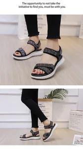 Detail of trendy platform sandals featuring woven straps and white comfort wedge soles