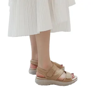Women's platform leather sports sandals in beige with adjustable velcro straps and wedge sole