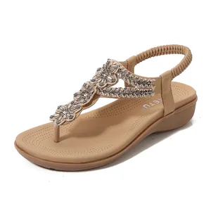 Sandales compensées femme couleur abricot avec fleurs en strass et bride élastique
