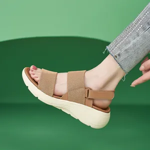 Women's thick platform sandals with khaki elastic woven upper and adjustable velcro strap
