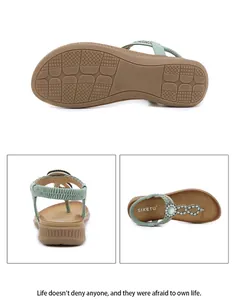 Detail view of Bohemian rhinestone sandals featuring mint green straps and rubber soles