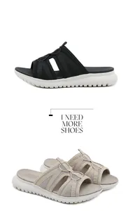Close-up of mesh upper and thick white sole on stylish casual athletic slide sandals