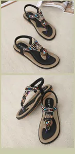 Λεπτομέρεια από φλατ σανδάλια boho με πολύχρωμες χάντρες, στρας και κρεμαστά καρδιές