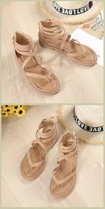 Detalle de sandalias gladiador de ante camello con correas cruzadas y cremallera posterior