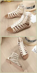 Detail of cross-strap gladiator sandals with metallic heel zipper and soft flat soles