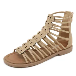 Beige Roman style flat sandals with crisscross straps and snakeskin pattern detailing